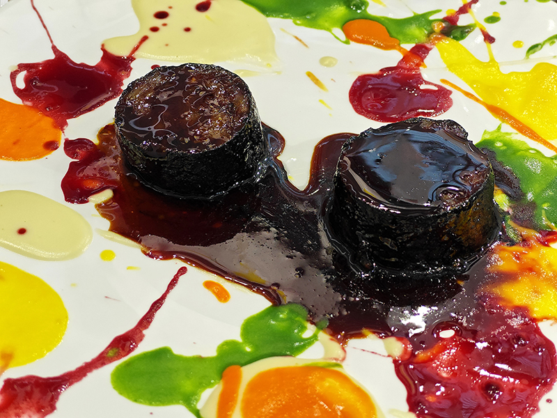 Beautiful psychedelic spin painted Cotechino Modena Igp piatto dello Chef Bottura 