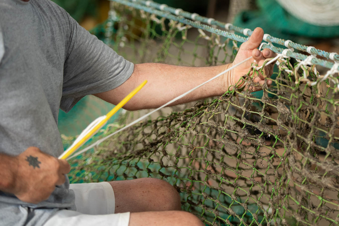 Rete e pescatore - foto Giorgia Morriello e Maurizio Cinti - Delta Cinematica